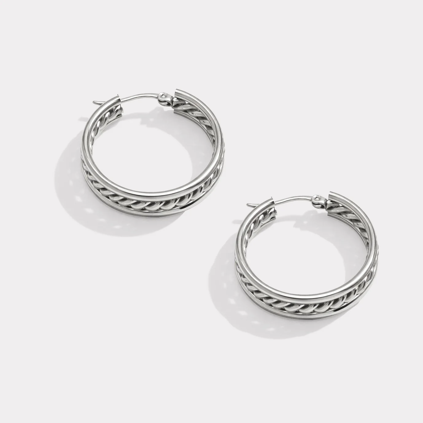 Boucles d'oreilles anneaux argentés à torsade centrale en acier inoxydable - Image 3
