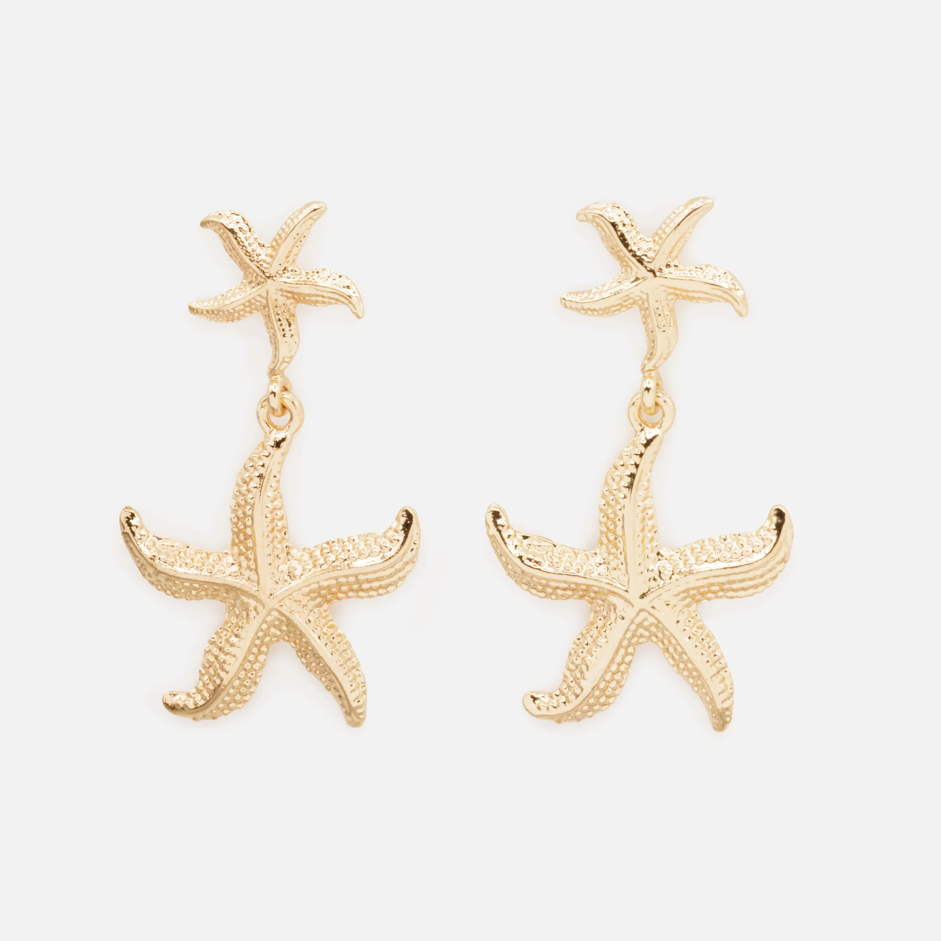 Boucles d'oreilles dorées double étoile de mer