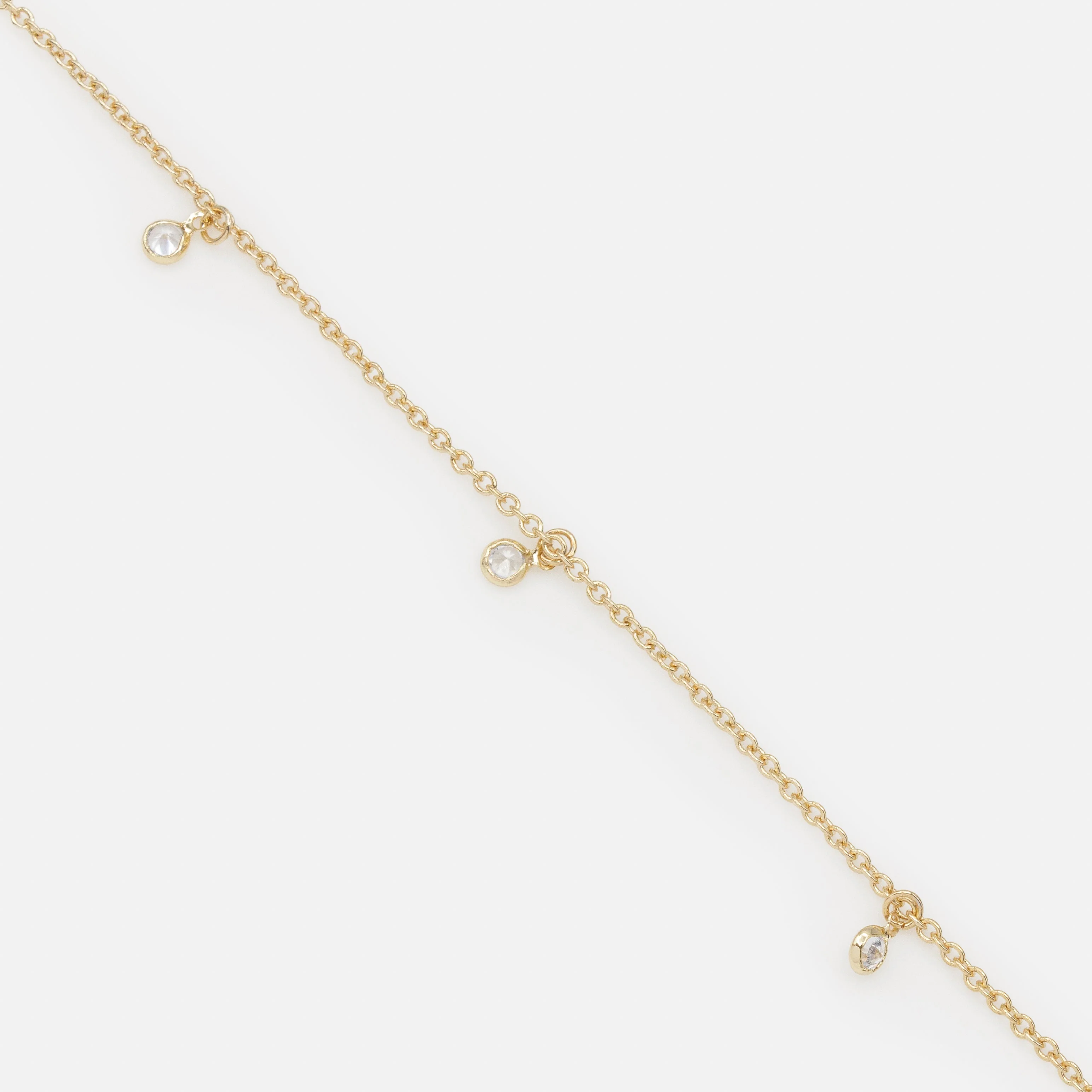 Bracelet doré petites breloques rondes avec zircons cubiques - Image 2