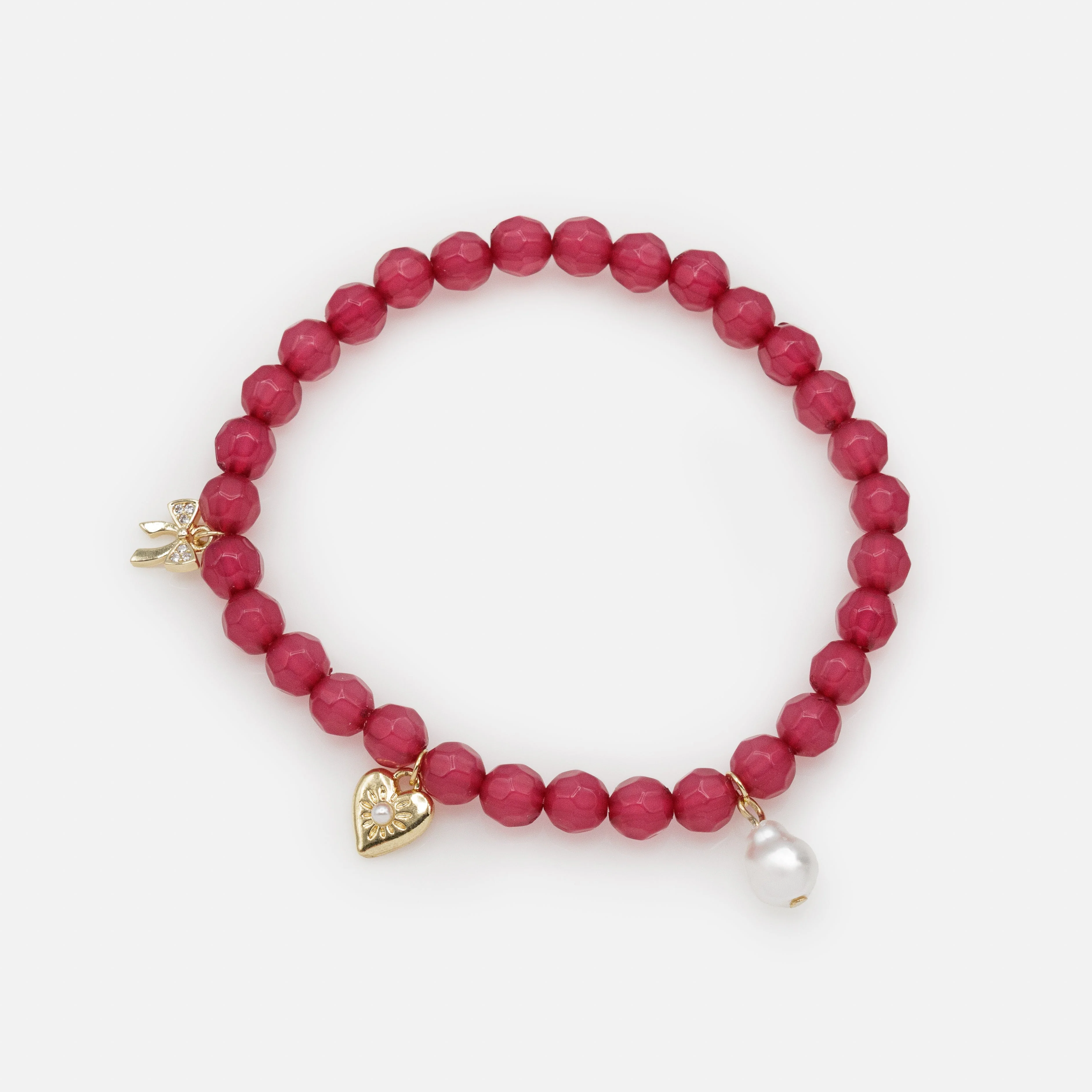 Bracelet élastique à billes rose foncé avec trio de breloques