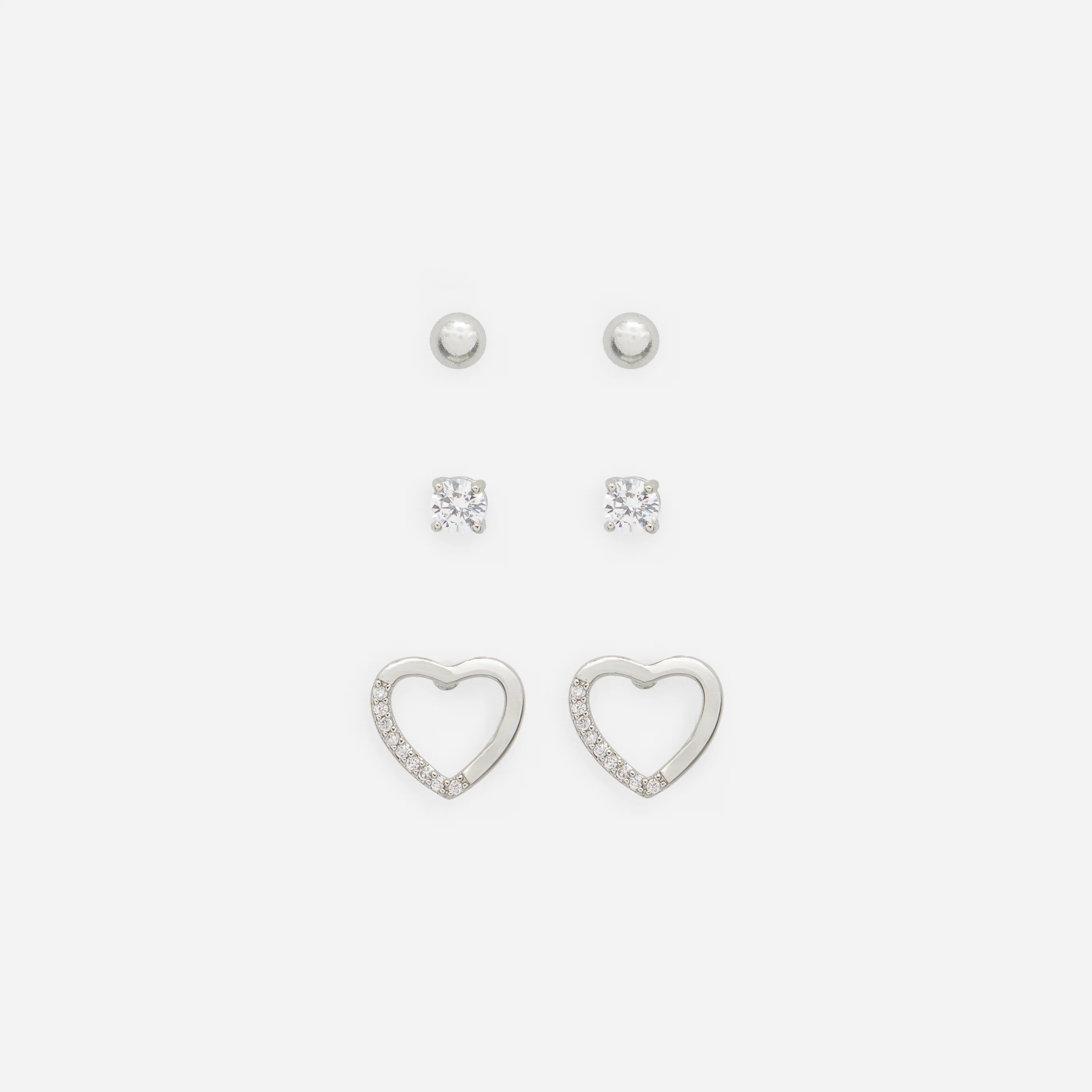 Trio de boucles d'oreilles argentées variées