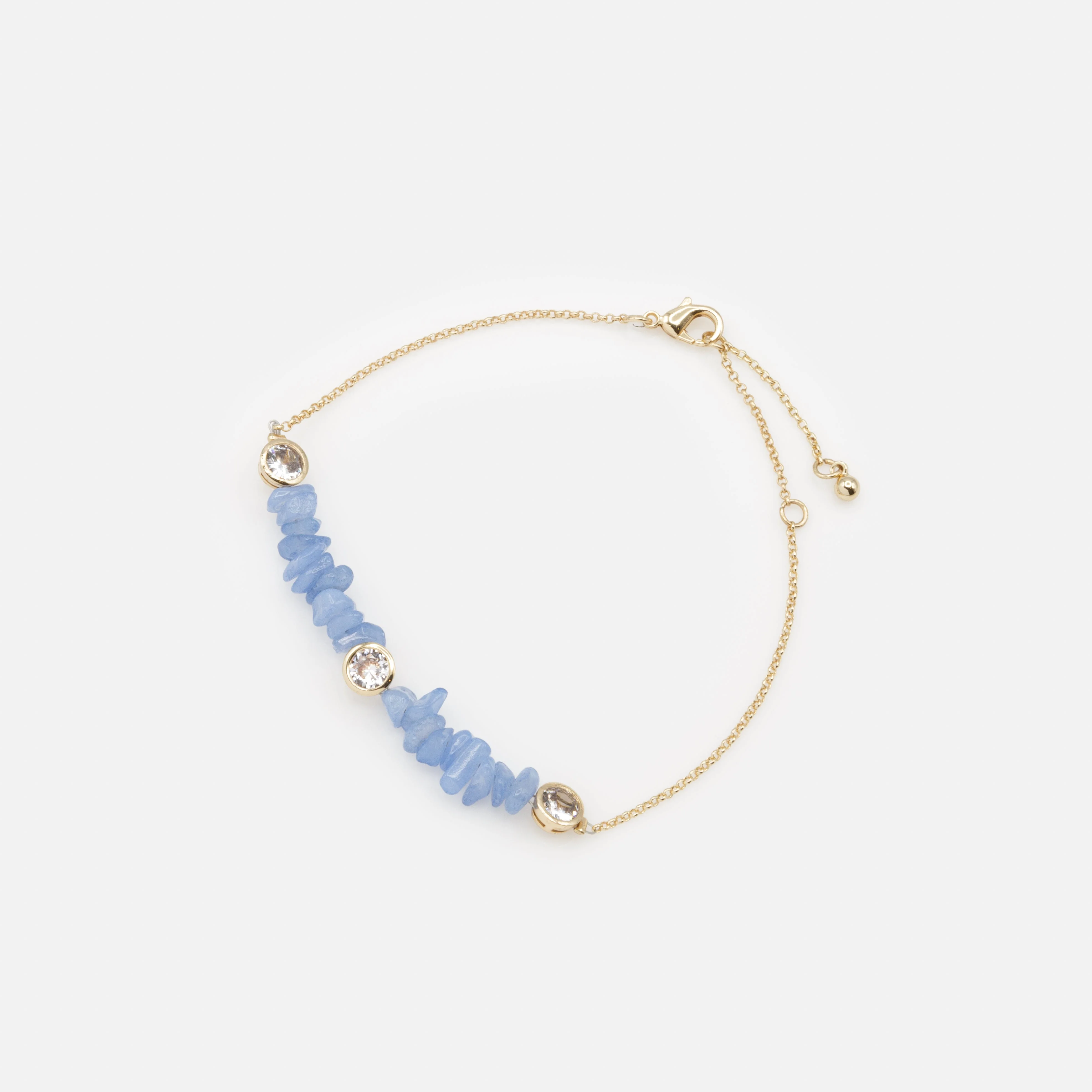 Bracelet doré petites pierres bleues