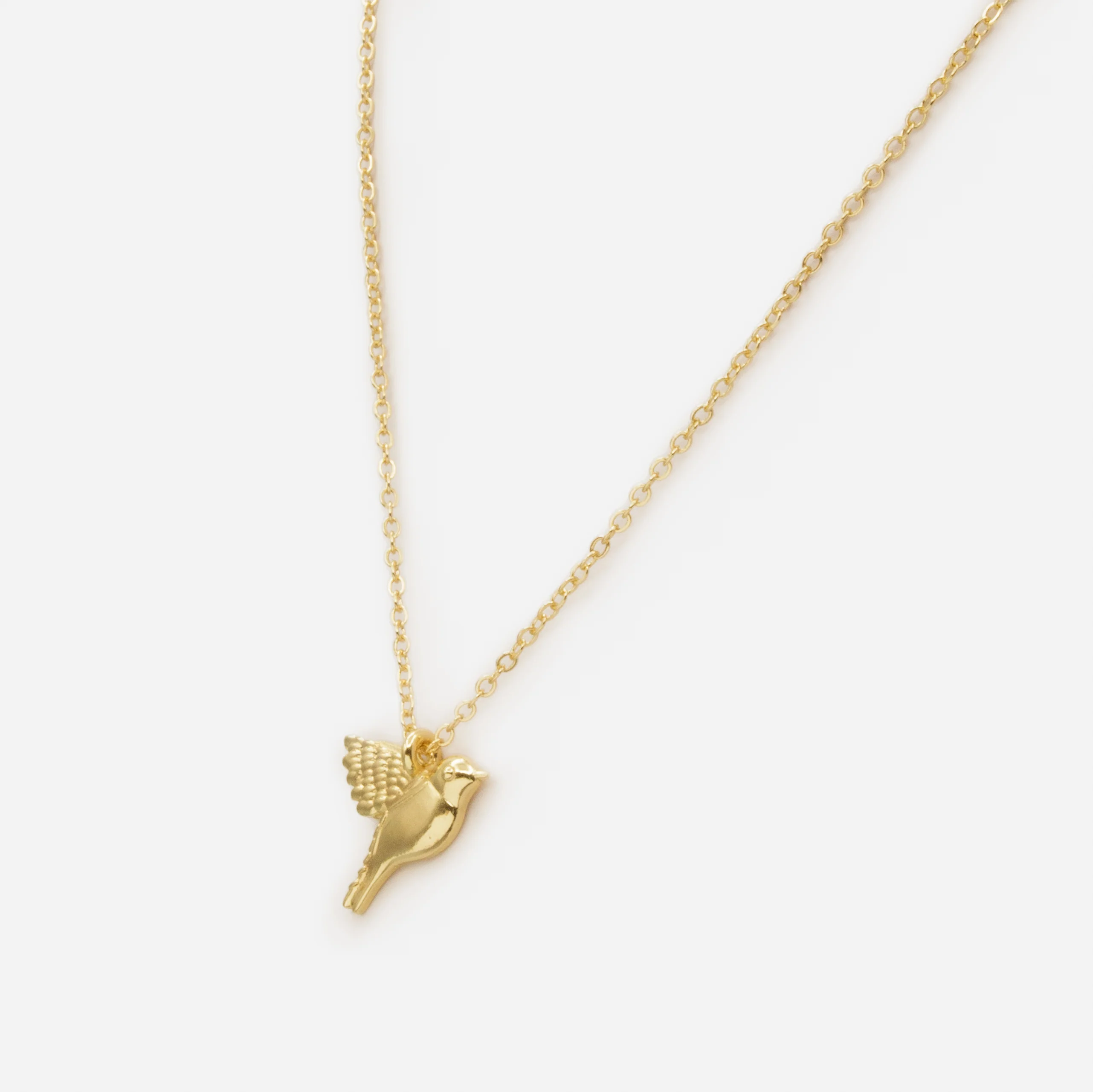 Collier doré avec breloque oiseau - Image 2