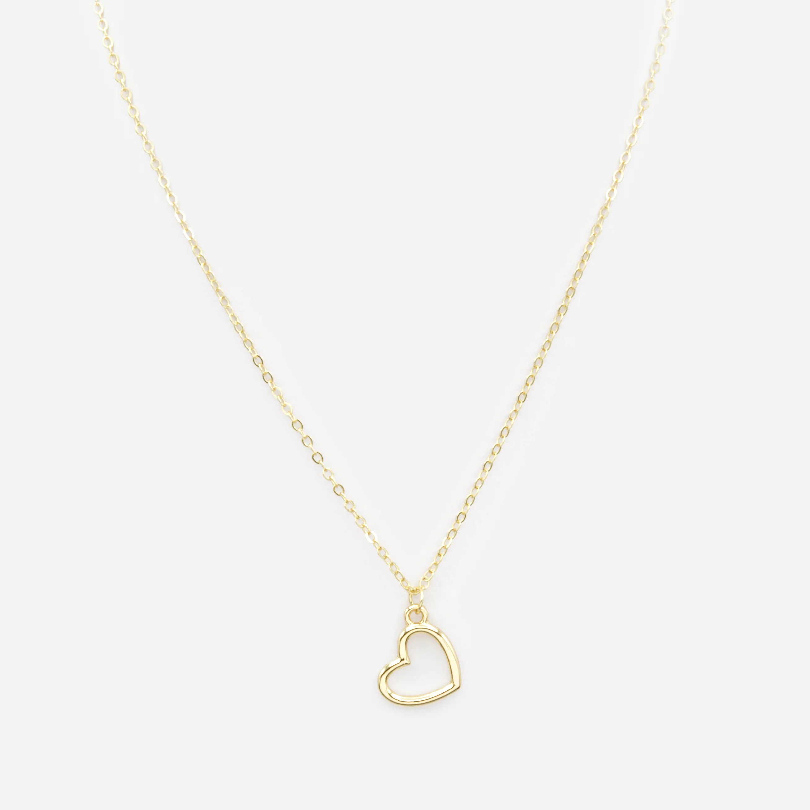 Collier doré avec breloque grand coeur