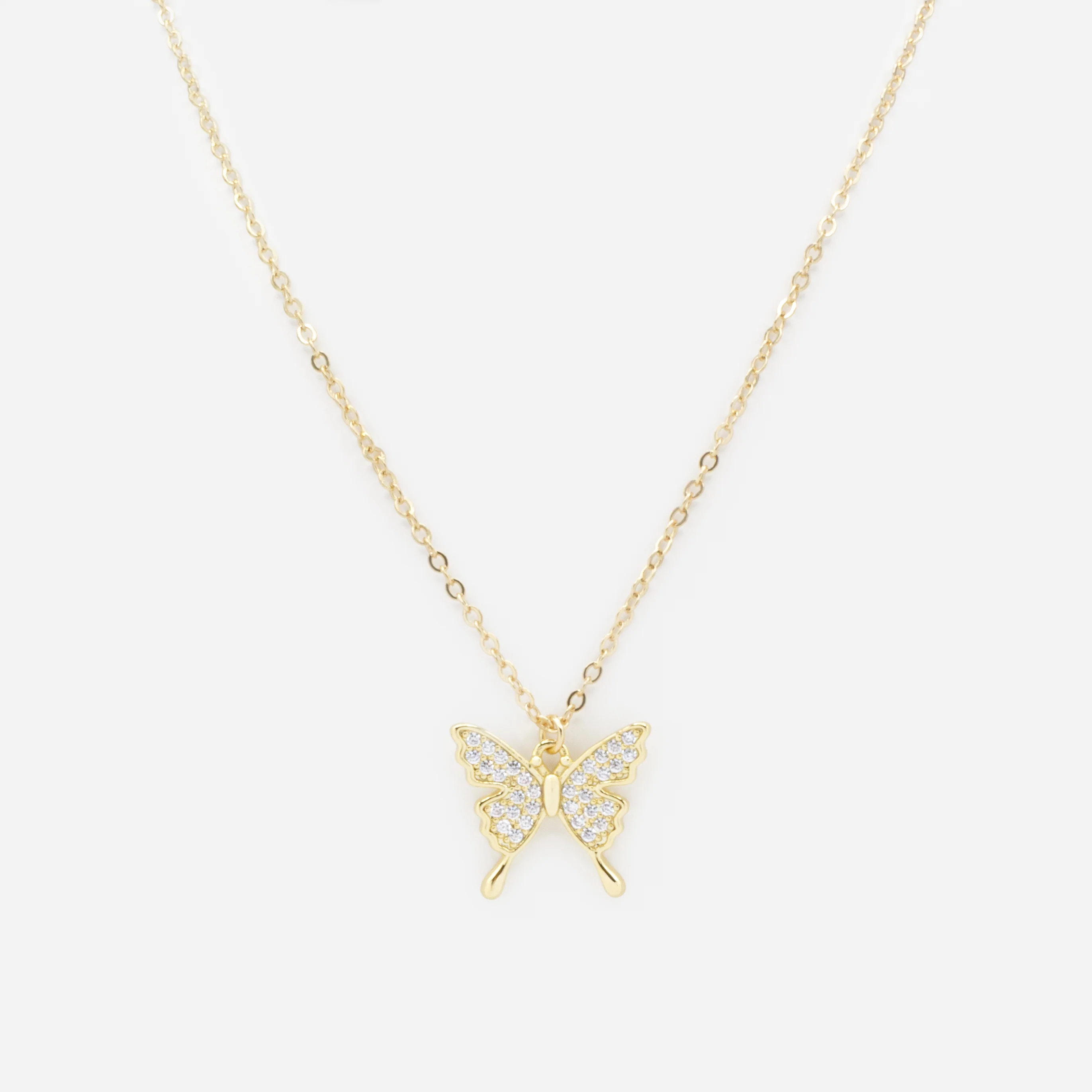 Collier doré avec breloque papillon et zircons cubiques
