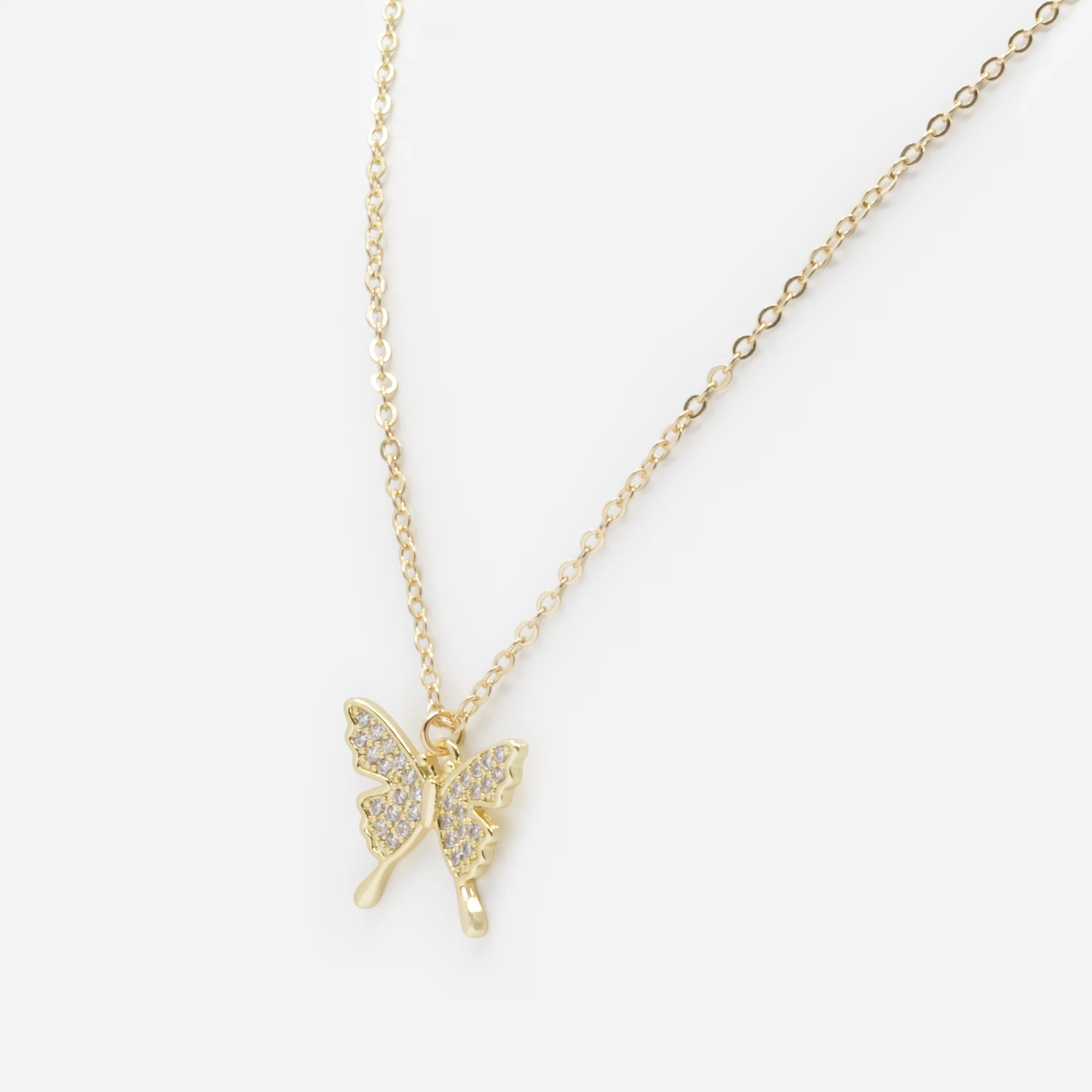 Collier doré avec breloque papillon et zircons cubiques - Image 2