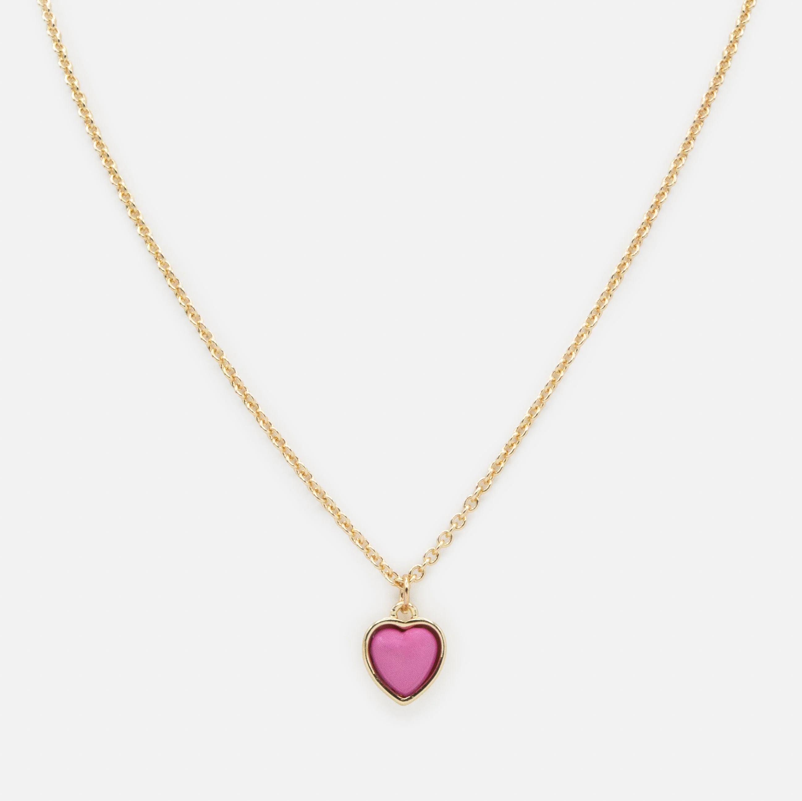 Collier doré breloque cœur rose