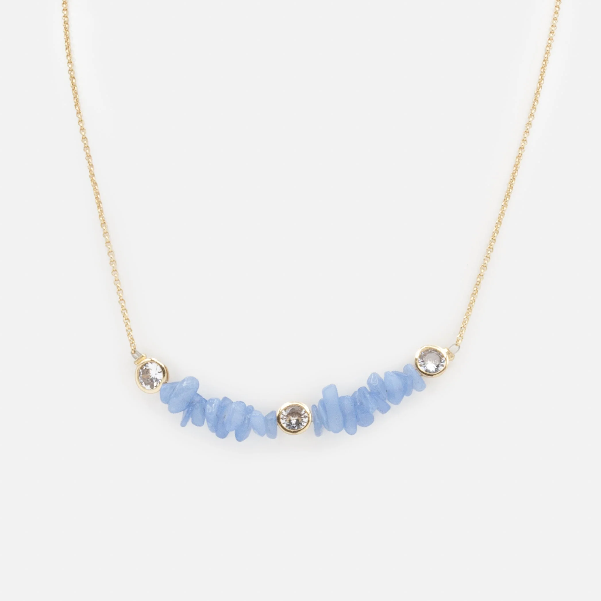 Collier doré petites pierres bleues