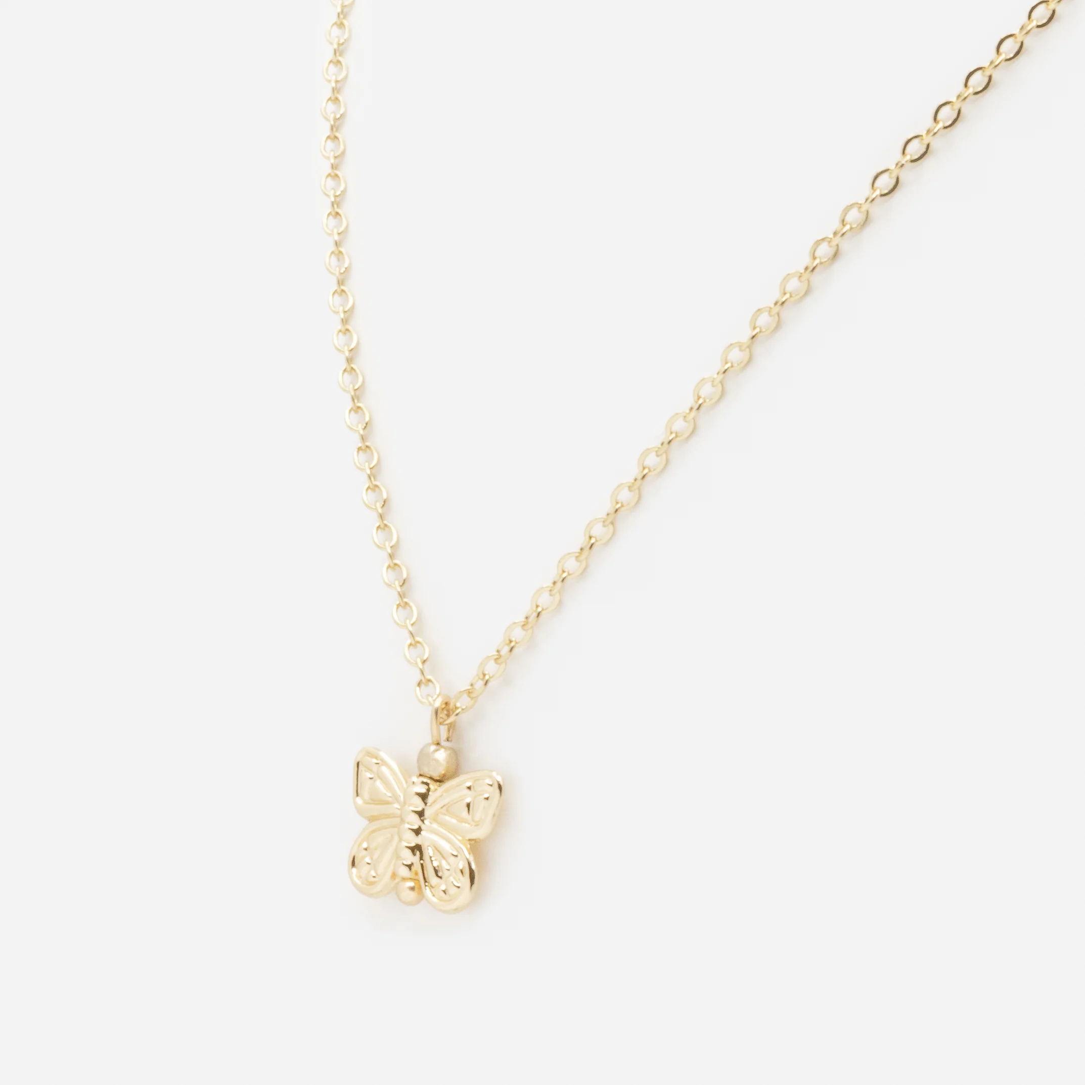 Collier doré avec breloque papillon - Image 2
