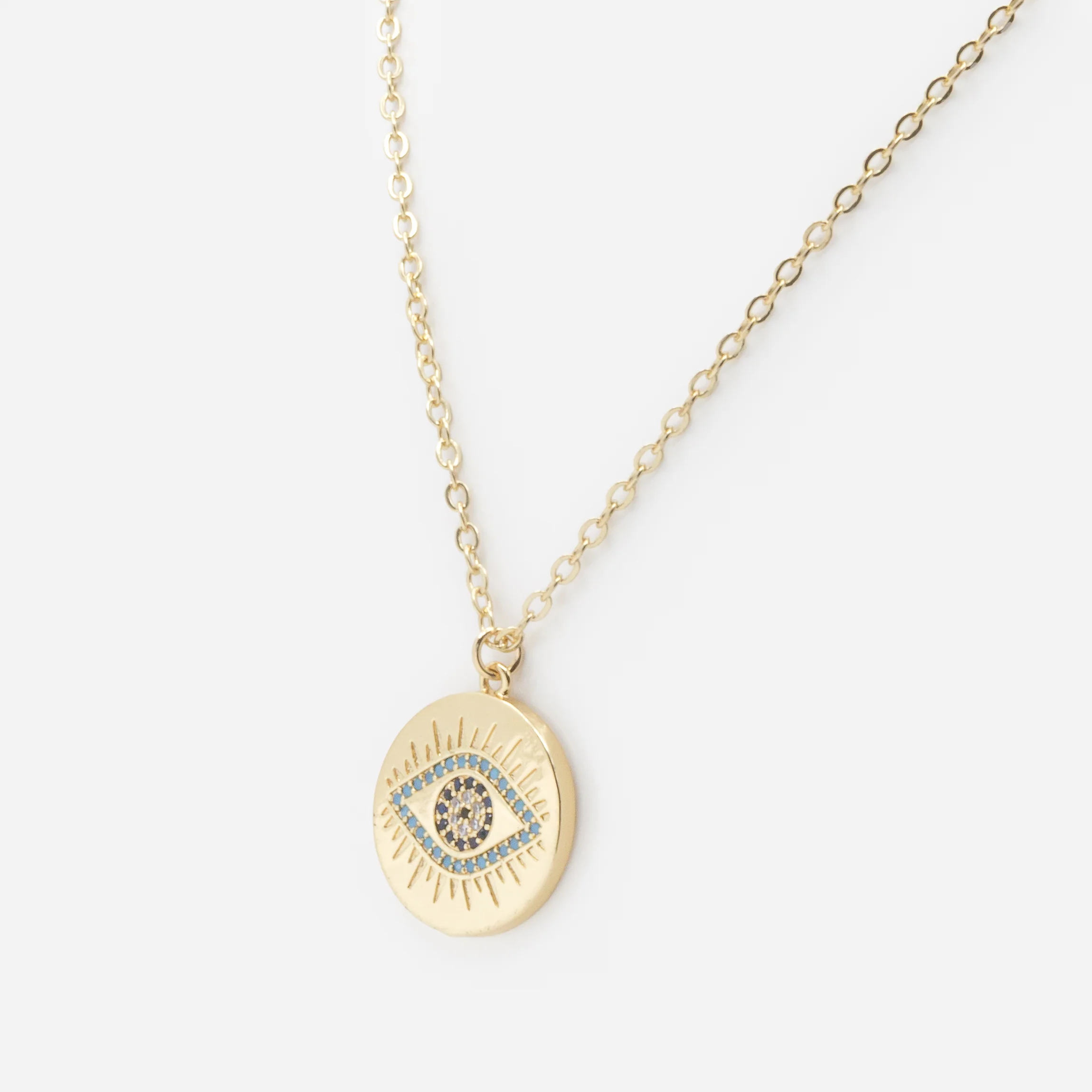 Collier doré avec breloque oeil protecteur et zircons cubiques turquoise - Image 2