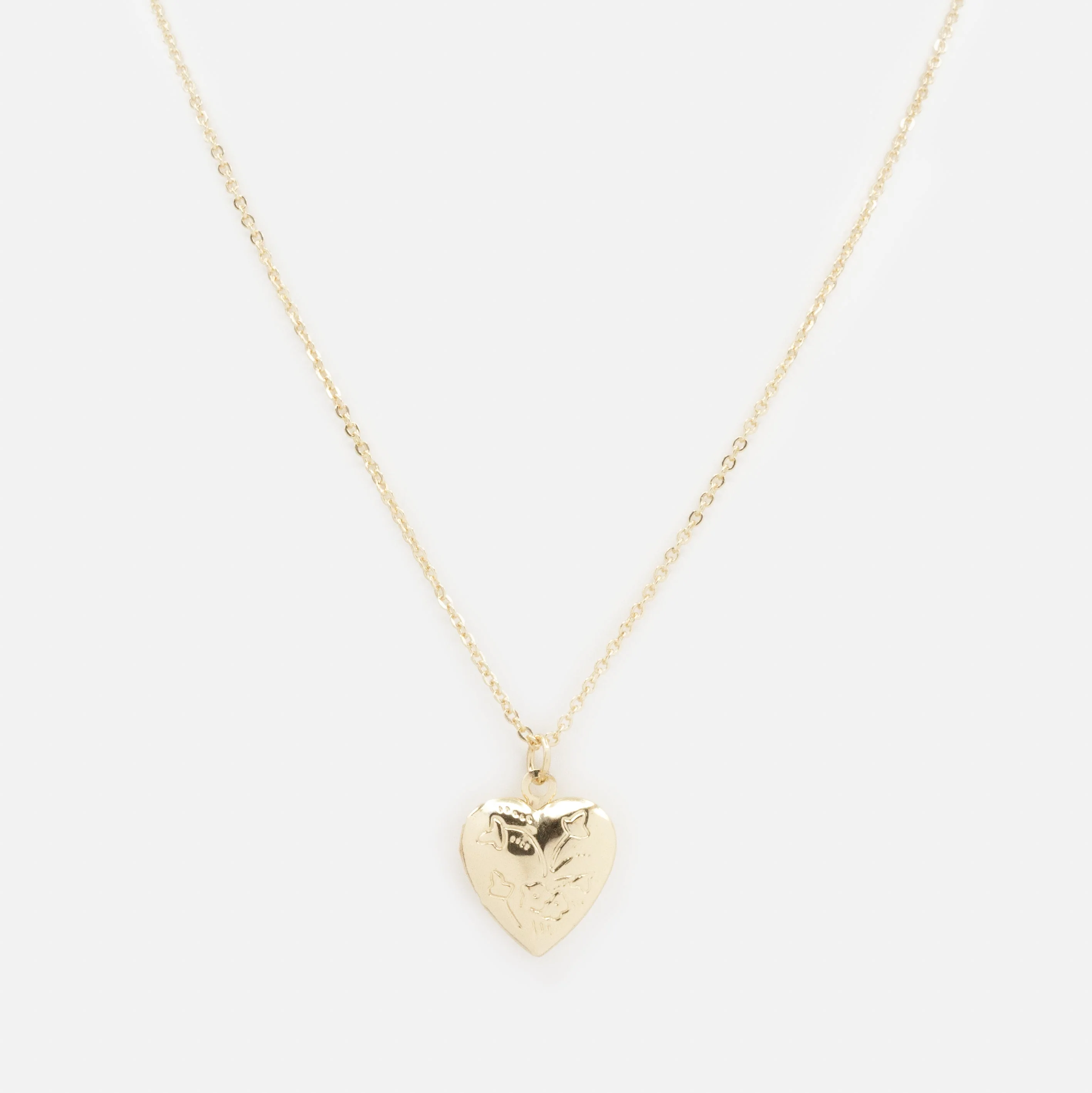 Collier doré médaillon cœur qui s'ouvre avec gravures