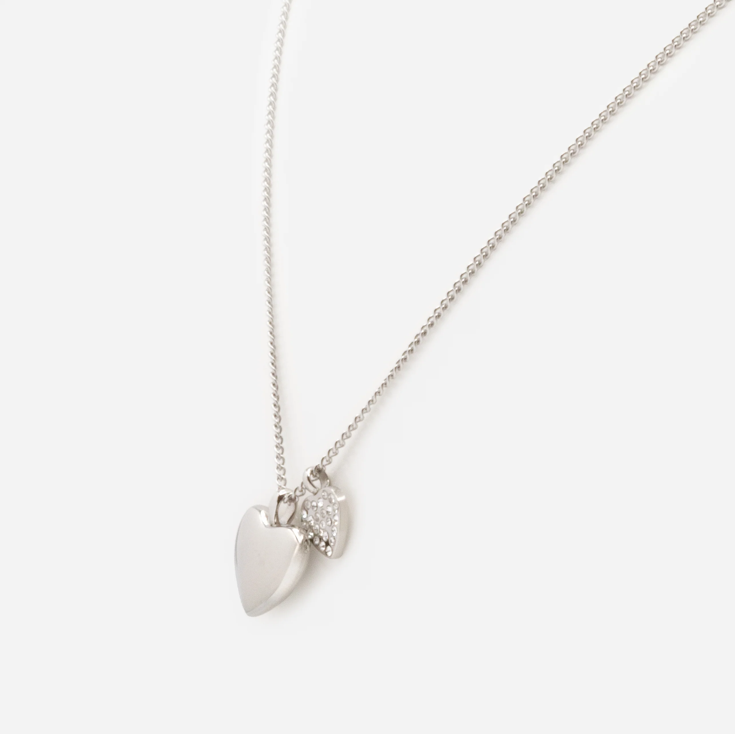 Collier argenté coeurs en duo avec zircons cubiques en acier inoxydable - Image 2