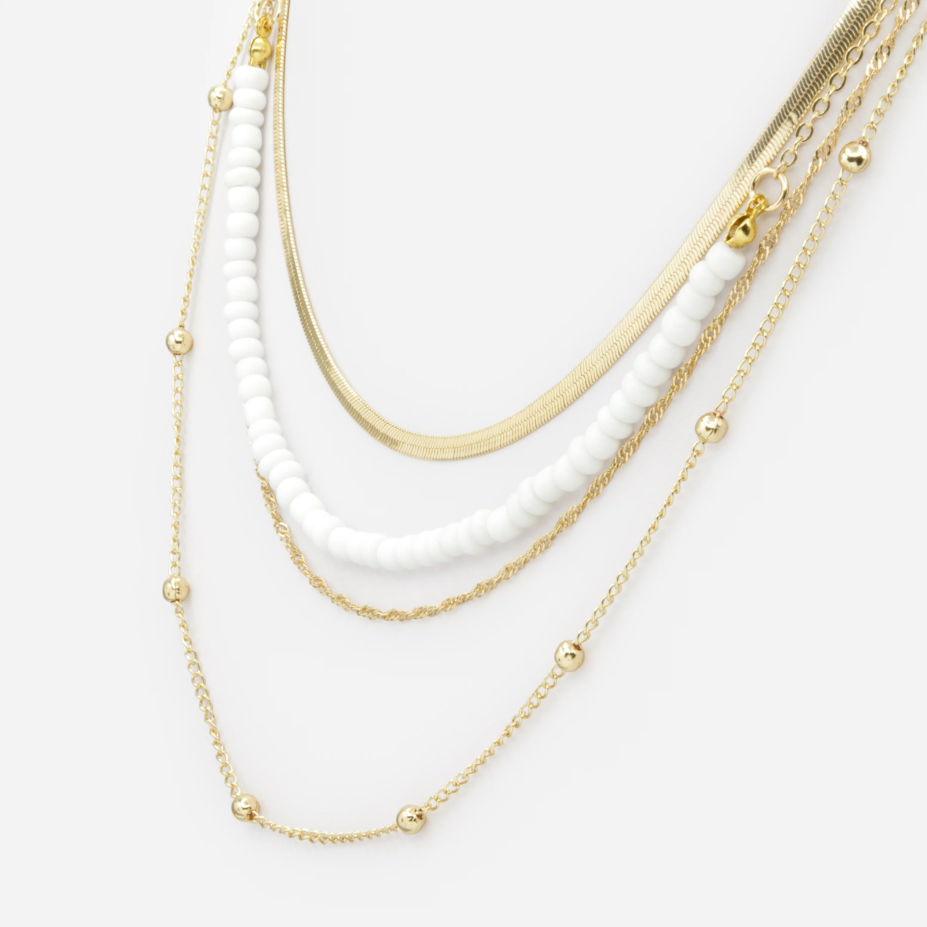 Collier quadruple chaîne dorée avec billes blanches - Image 2