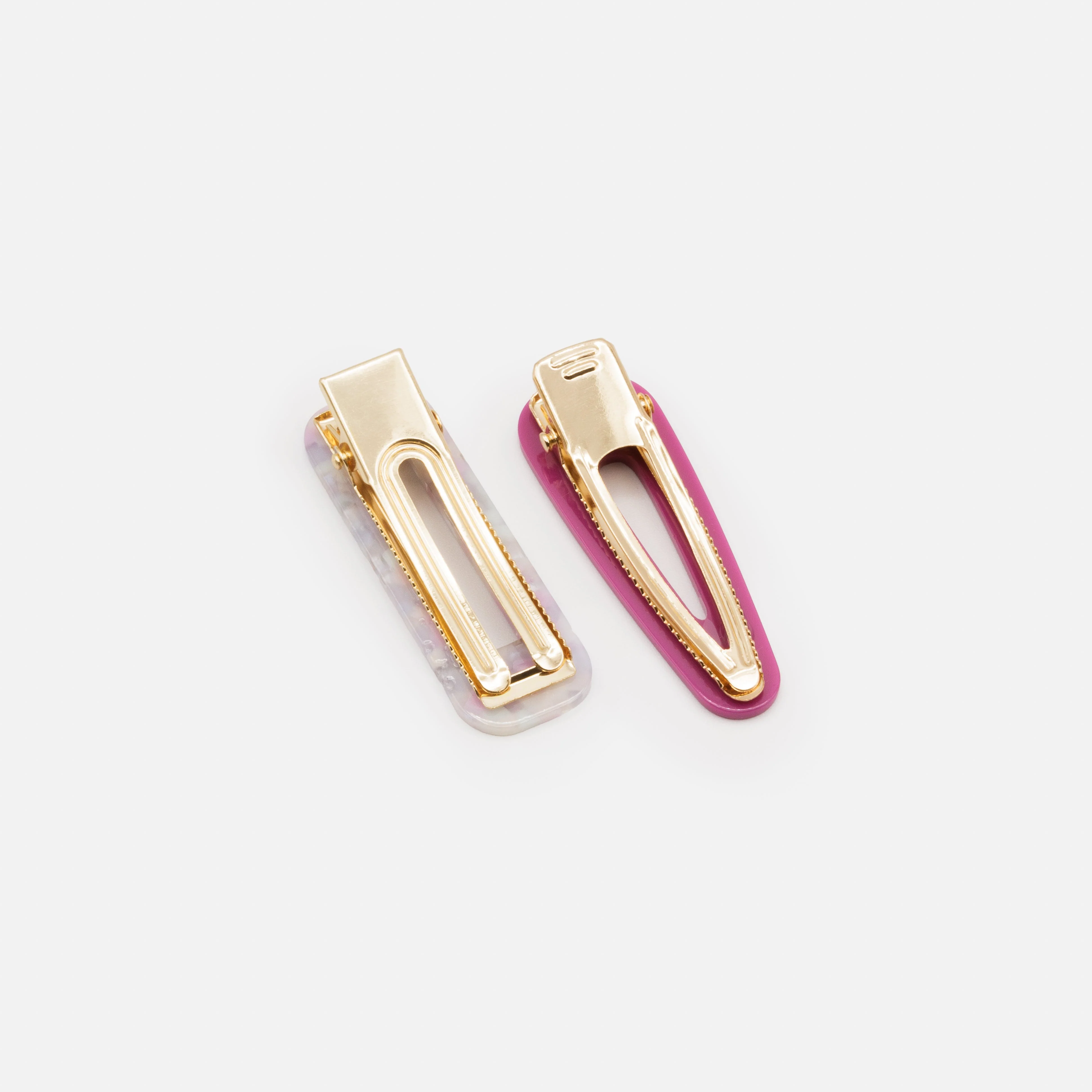 Deux pinces en plastique tons de mauve - Image 2