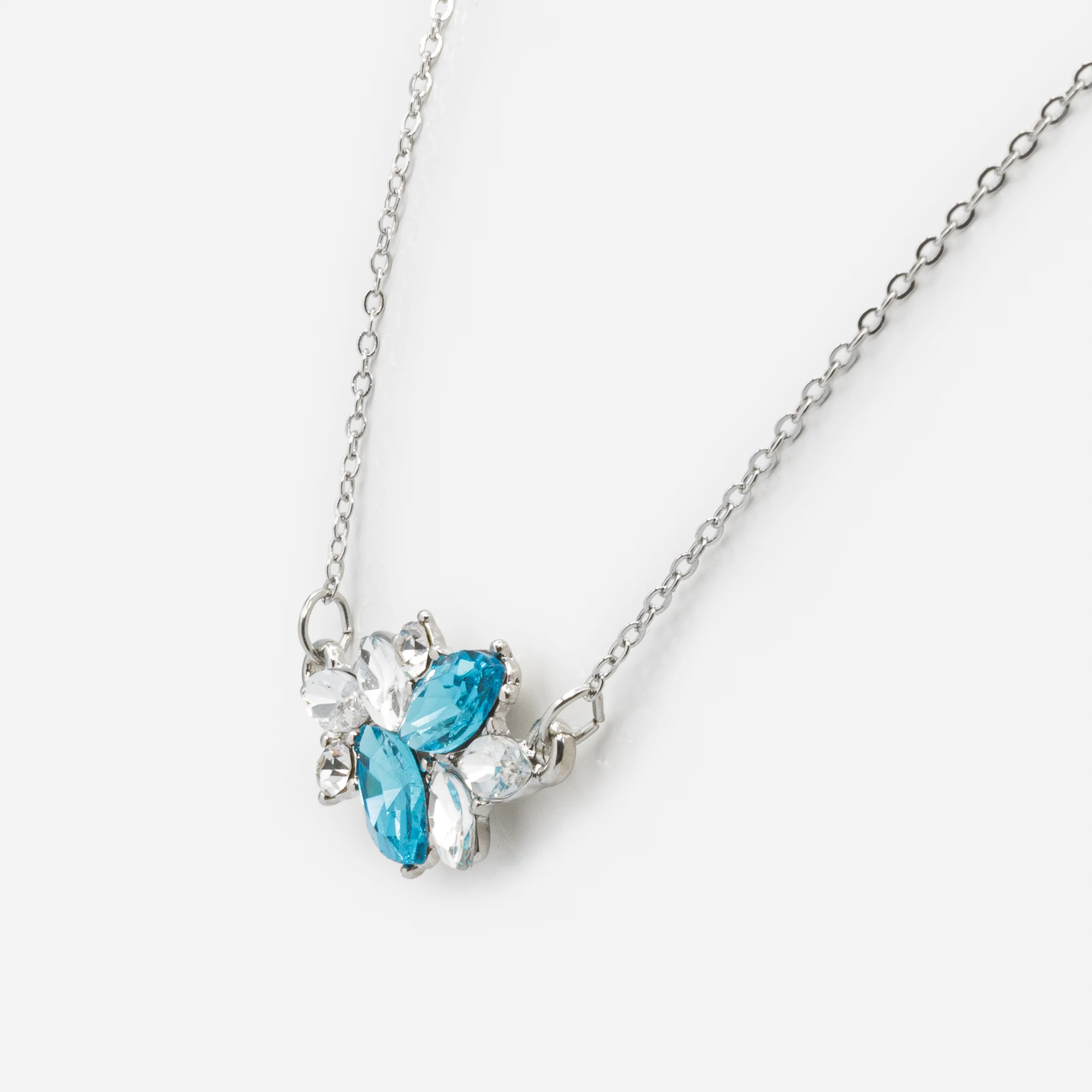 Ensemble collier et boucles d'oreilles pendantes argentés avec pierres blanches et turquoise - Image 4