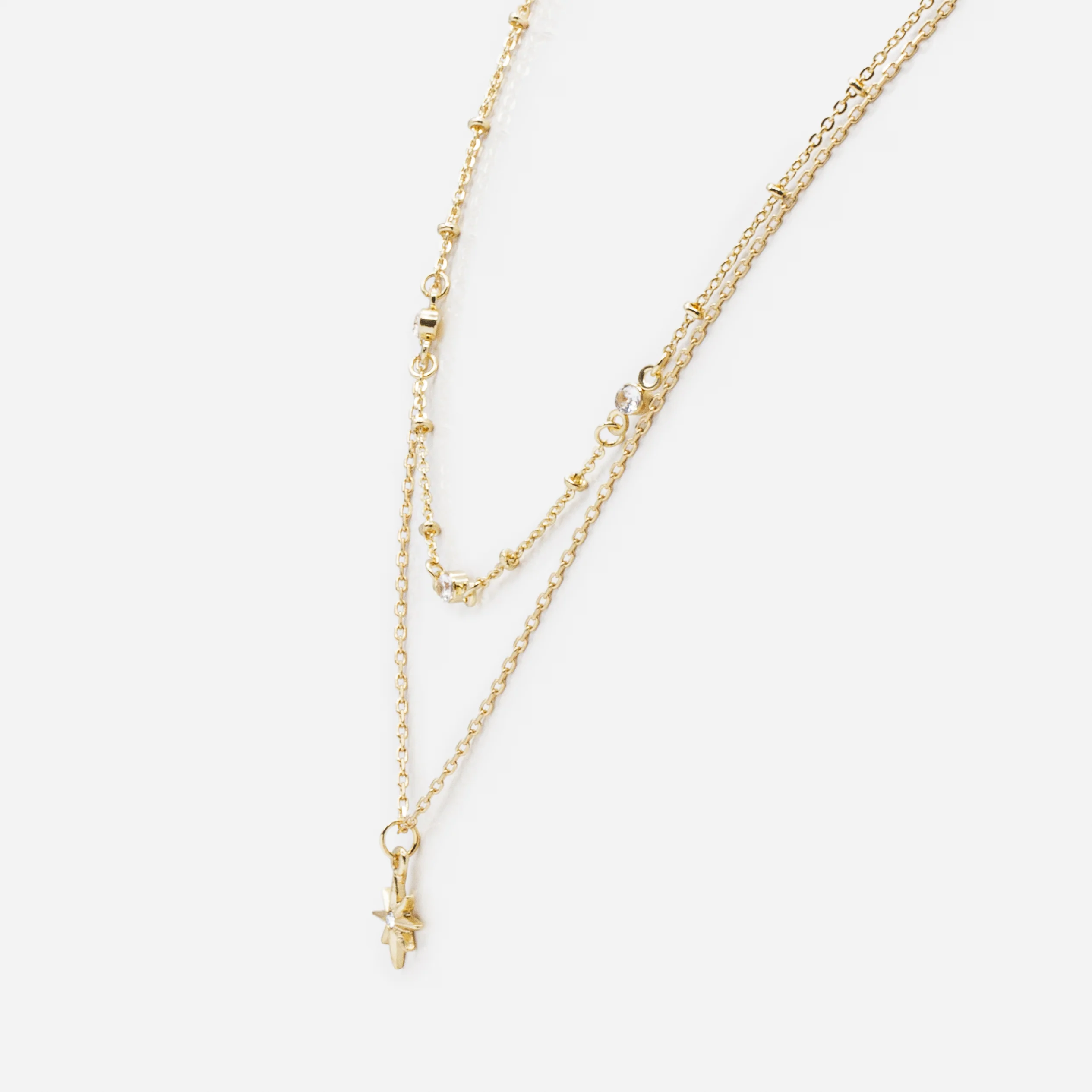 Ensemble de deux colliers dorés étoile et zircons cubiques - Image 4