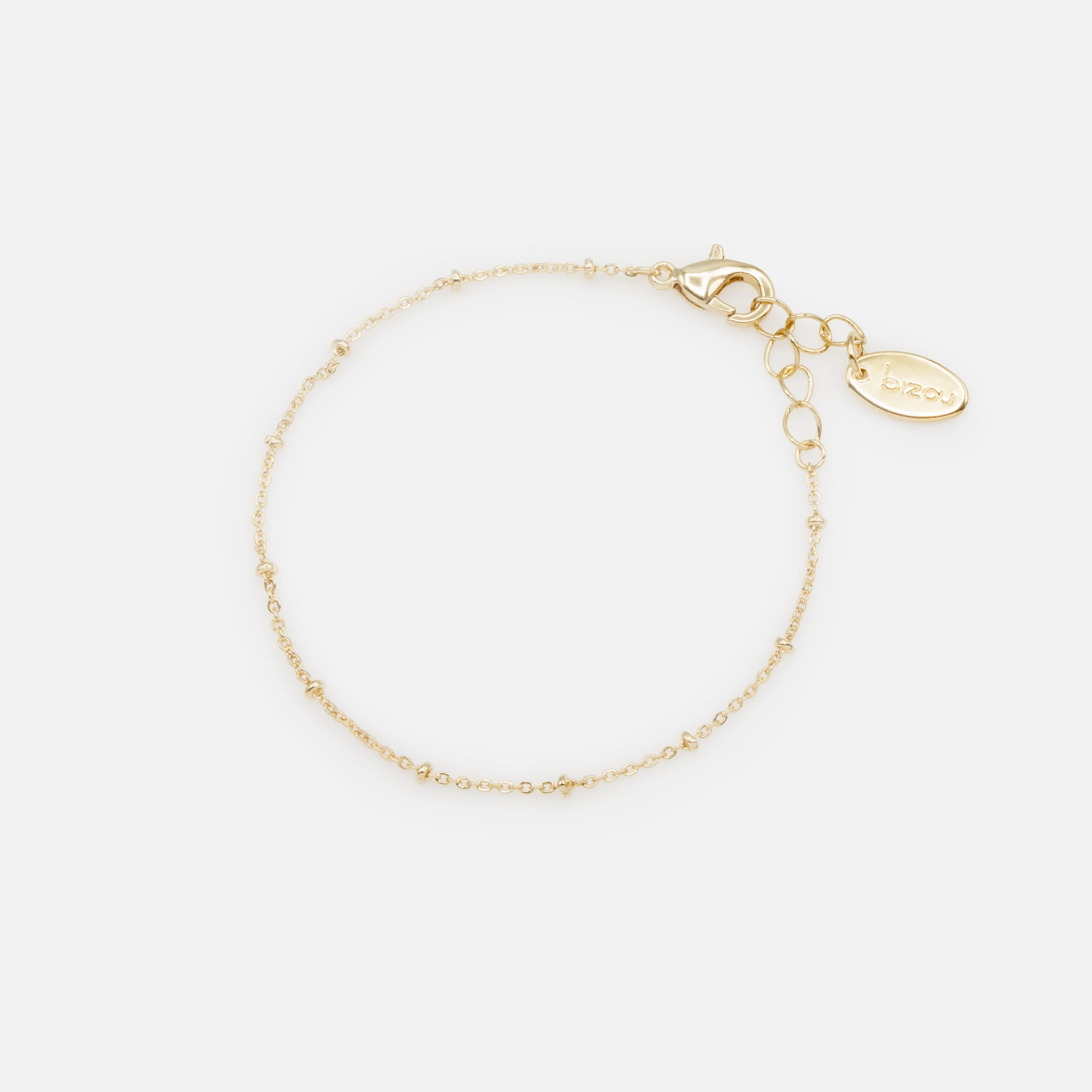 Ensemble de quatre bracelets dorés avec mailles originales - Image 4