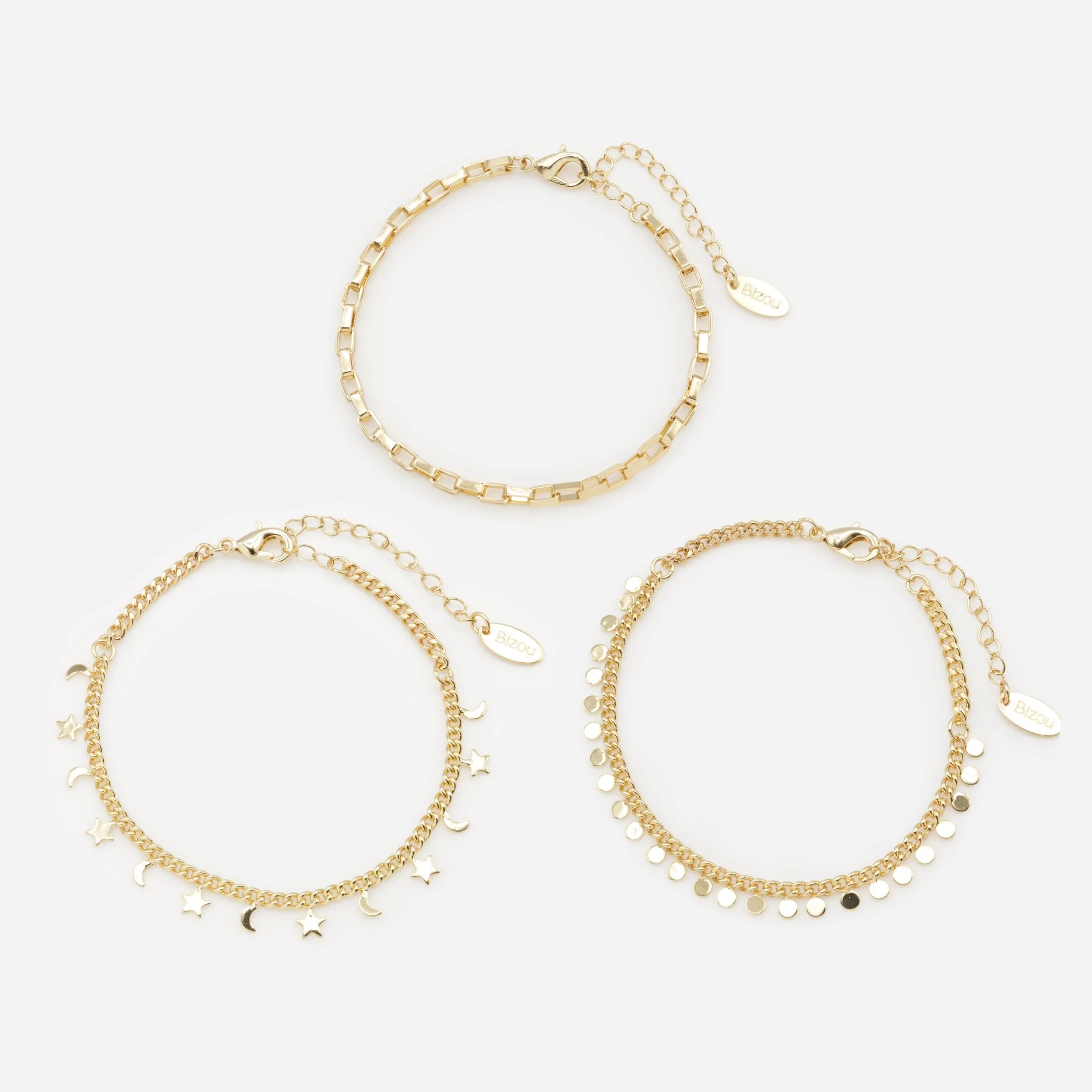 Trio de bracelets dorés à breloques lune, étoile et cercle
