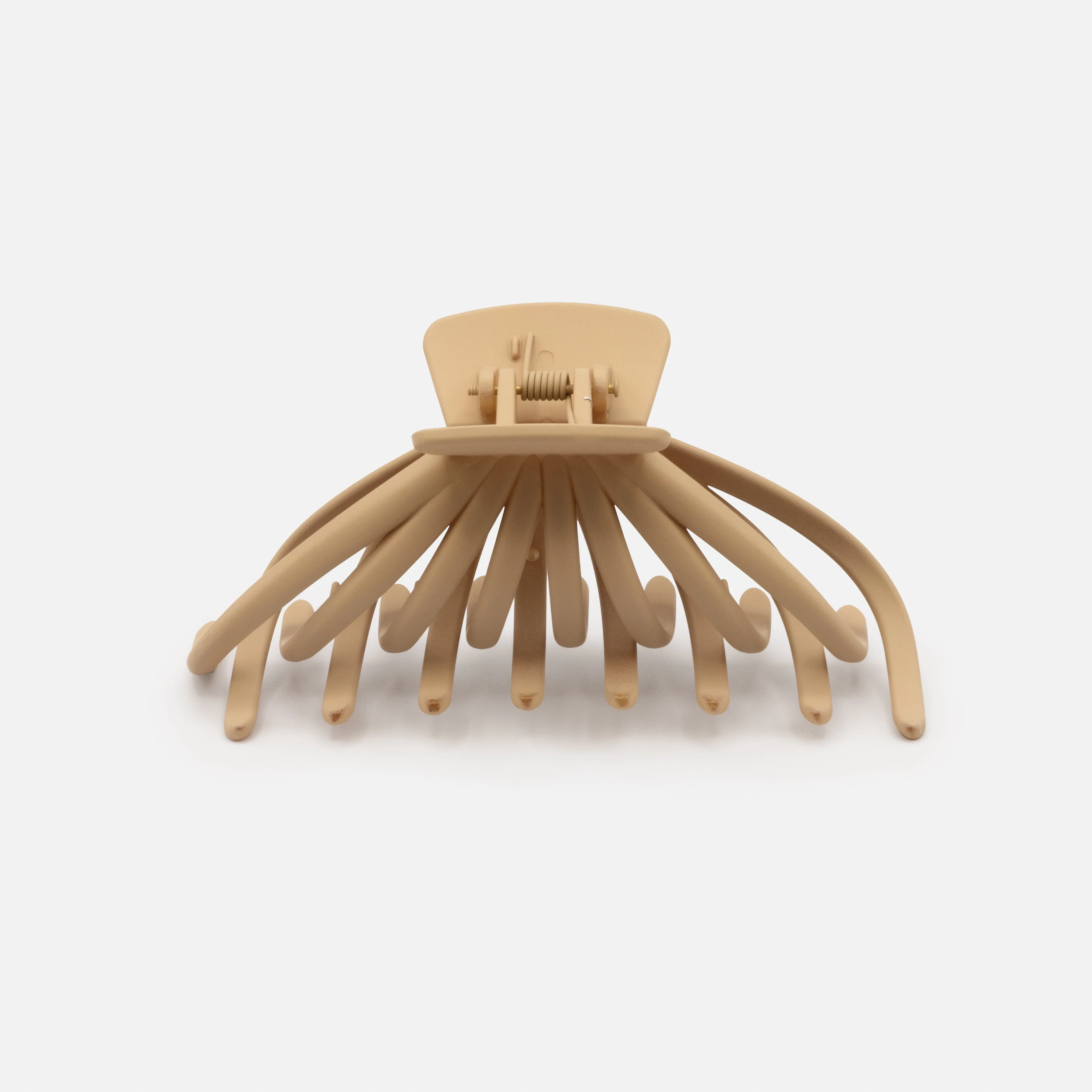 Pince pieuvre beige en plastique au fini mat