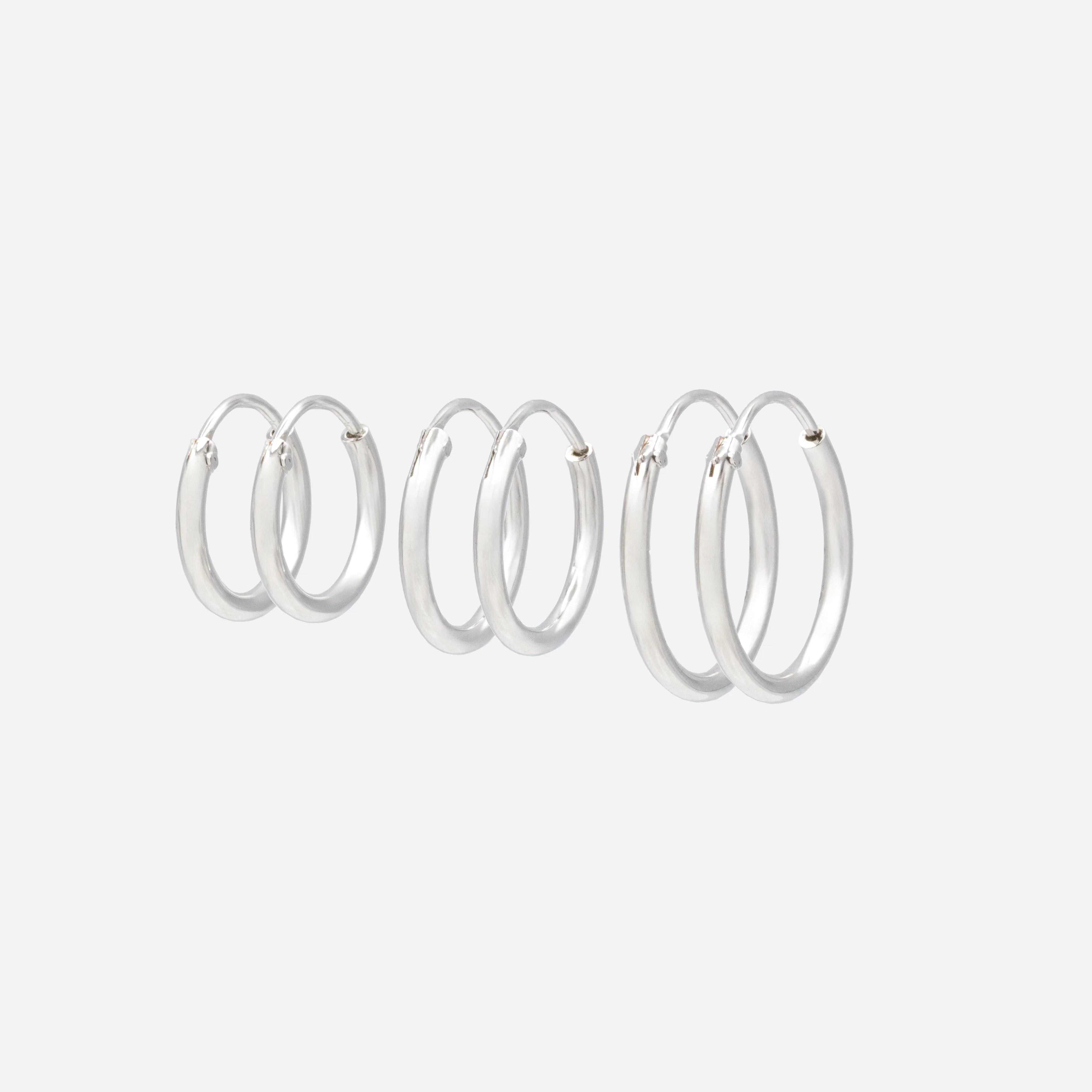 Trio de boucles d'oreilles dormeuses argentées
