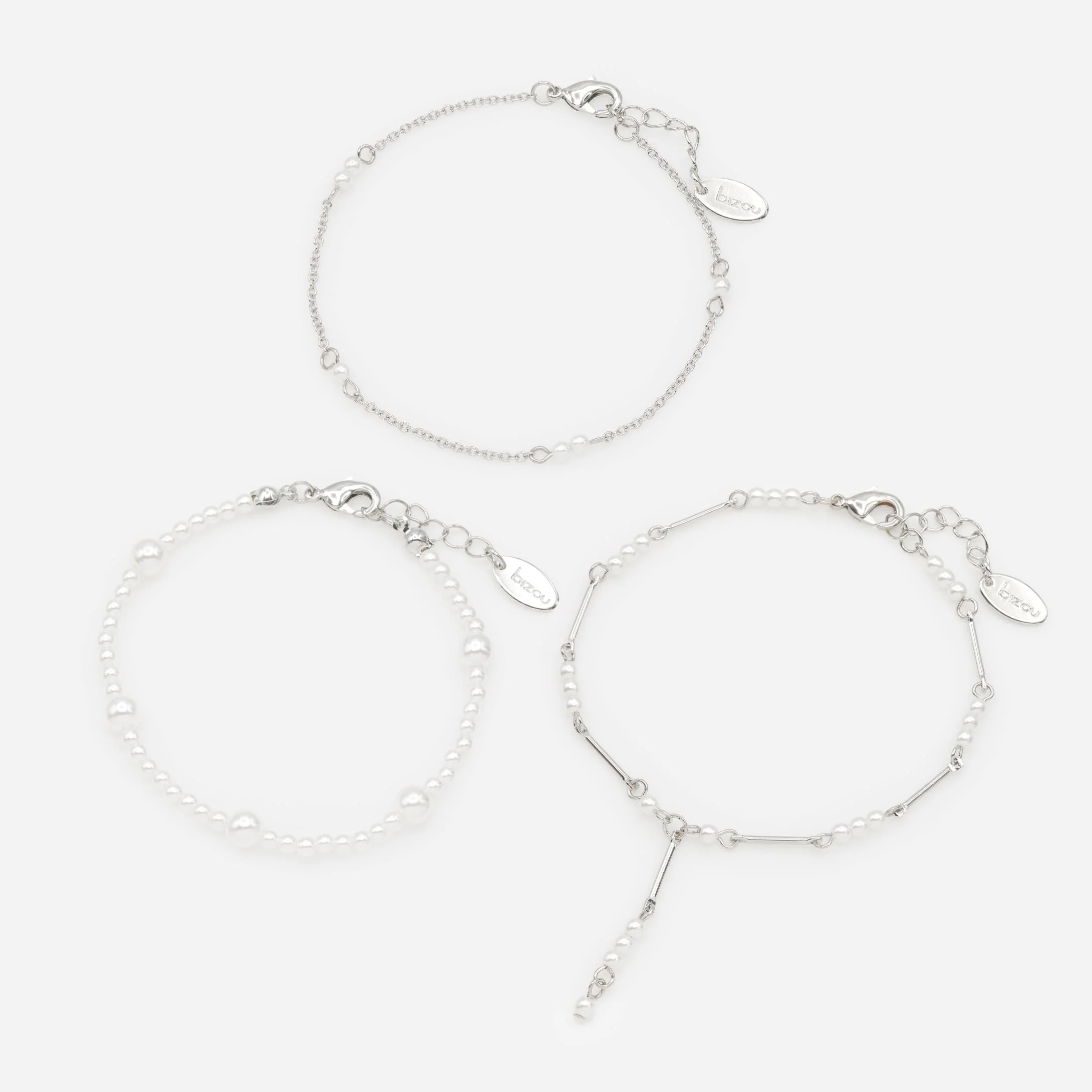 Trio de bracelets argentés avec perles