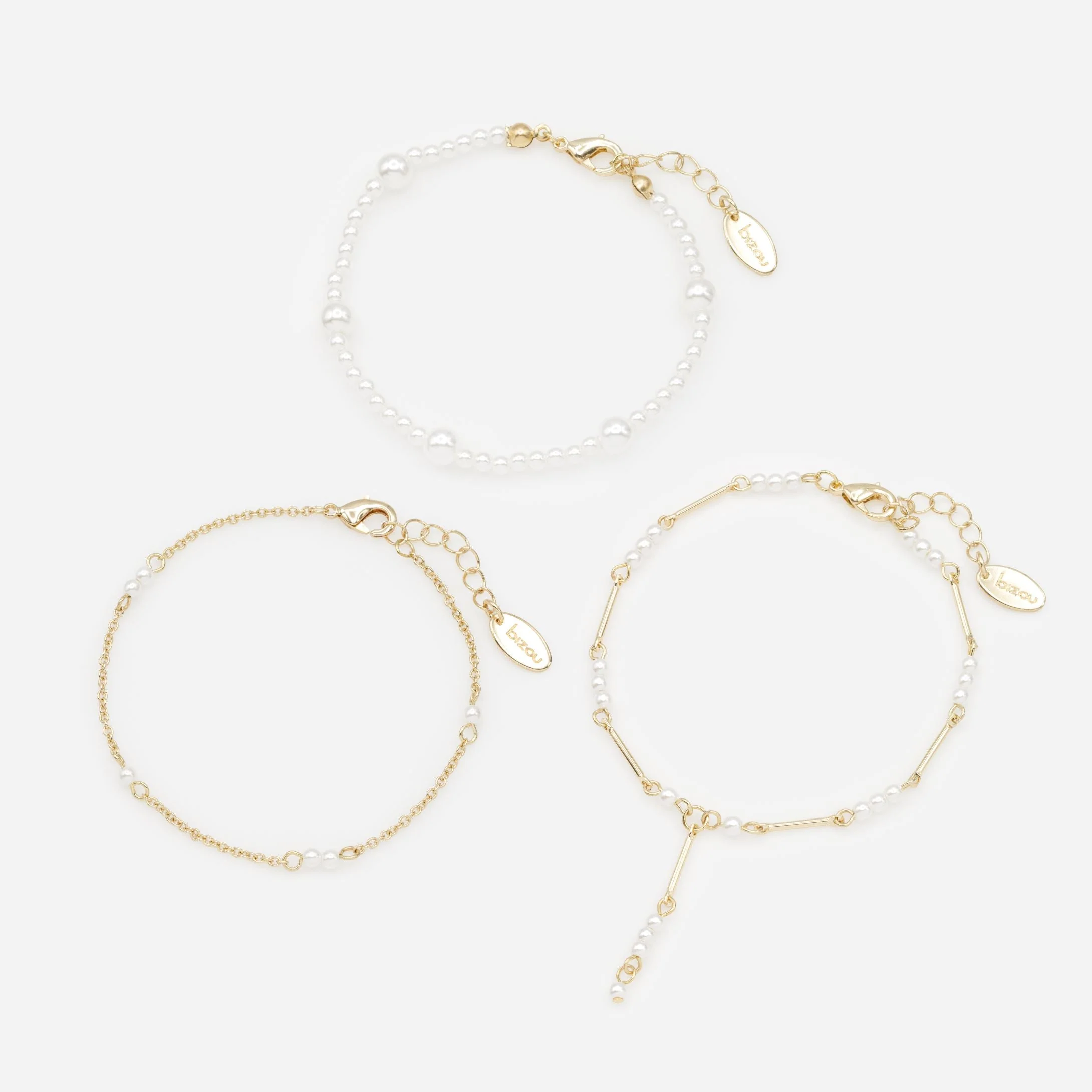 Trio de bracelets dorés avec perles